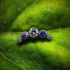 Cluster con circonitas moradas y blancas de titanio grado implante 1,2mm