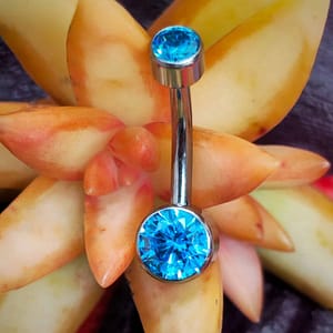 Piercing de ombligo de titanio grado implante y circonitas azules 1,6mm
