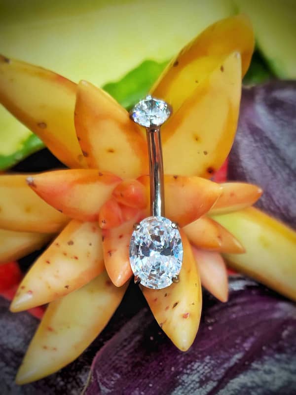 Piercing de ombligo de titanio grado implante con circonitas ovaladas blancas 1,6mm