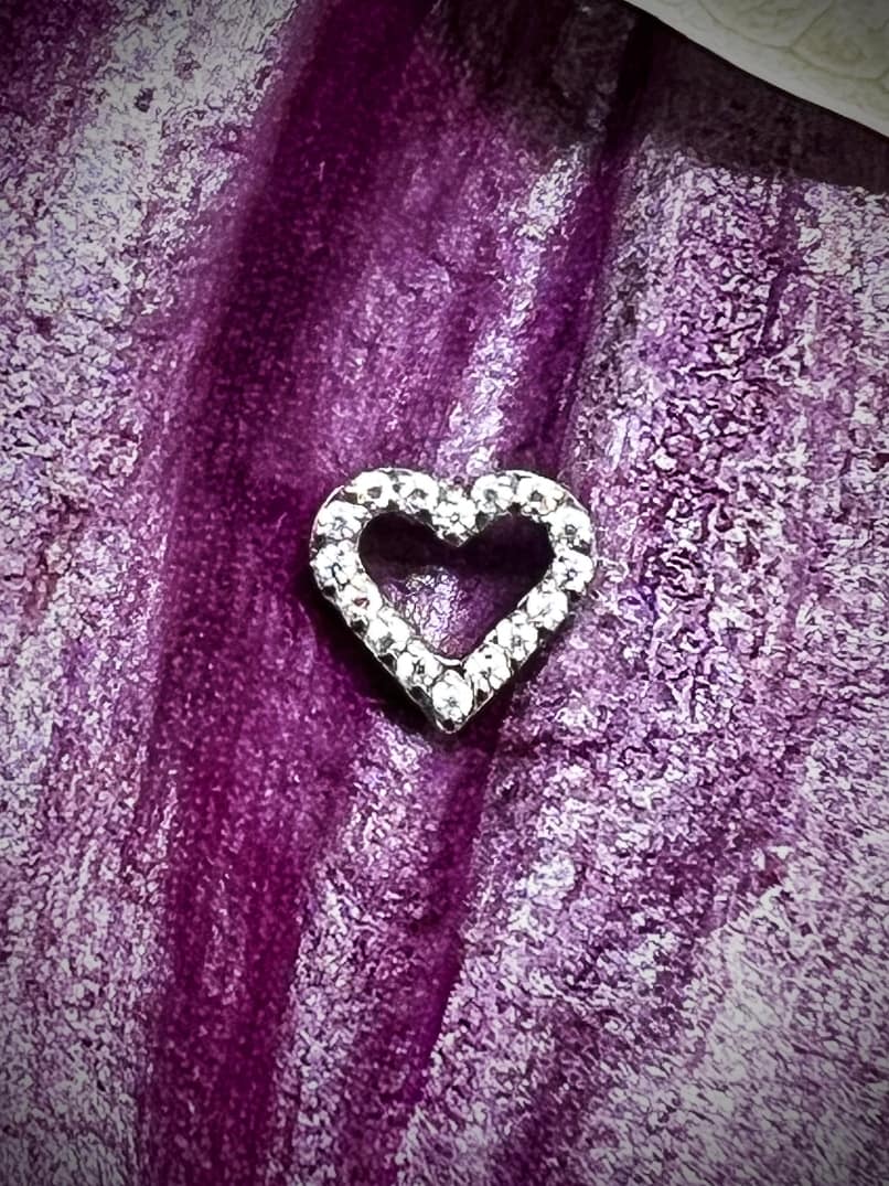 Corazón de titanio grado implante y circonitas blancas de 1,2mm